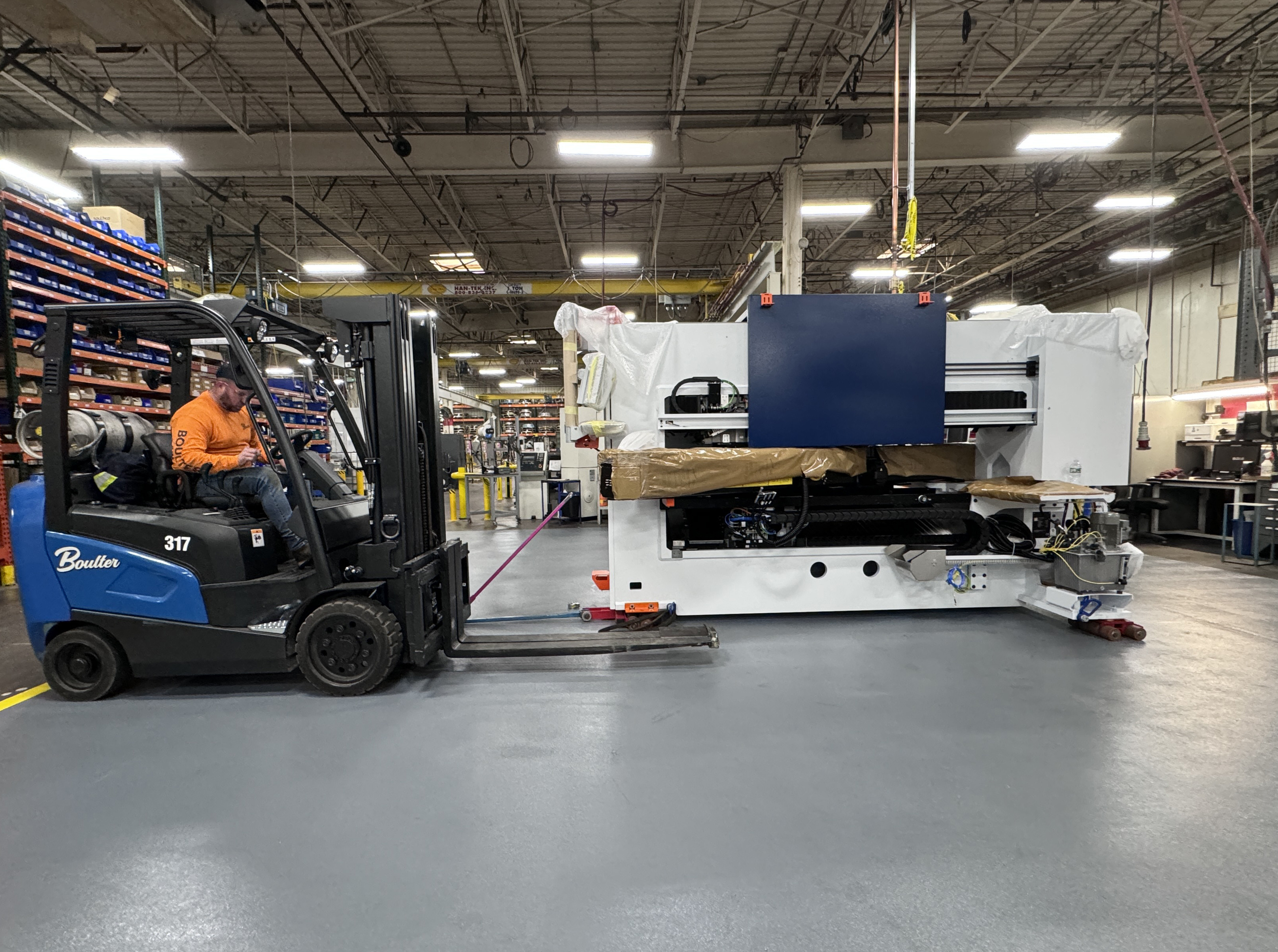 <p>Moving Trumpf CNC punch press into place</p>