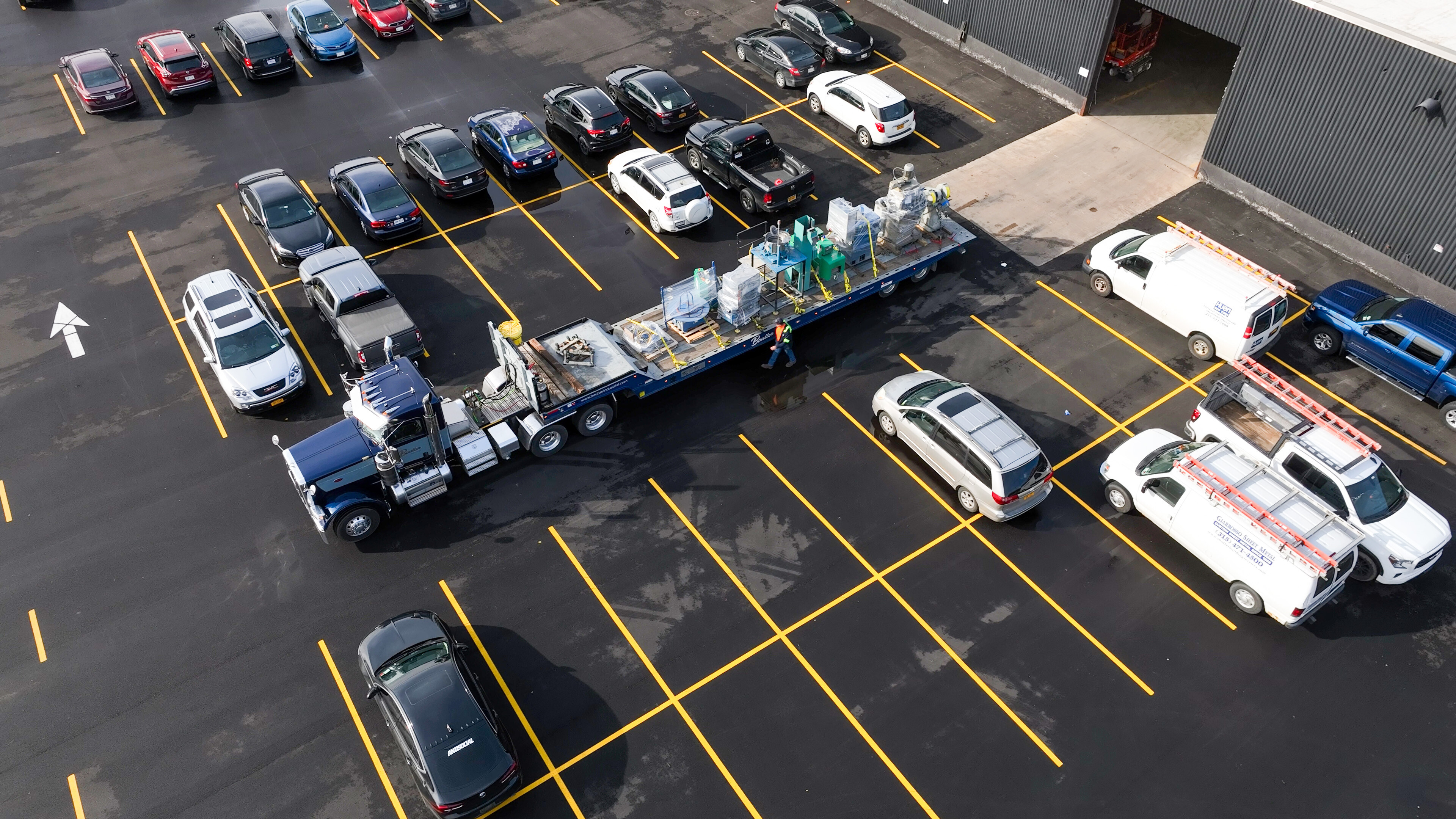 Backing a truck into Midstate Spring with machinery